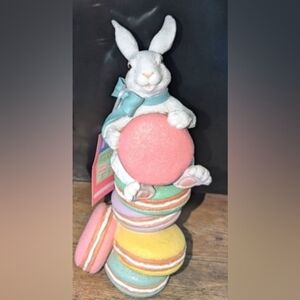 Easter bunny holding and sitting on holiday decor, NEW